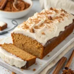 healthy gingerbread eggnog loaf with cream cheese frosting